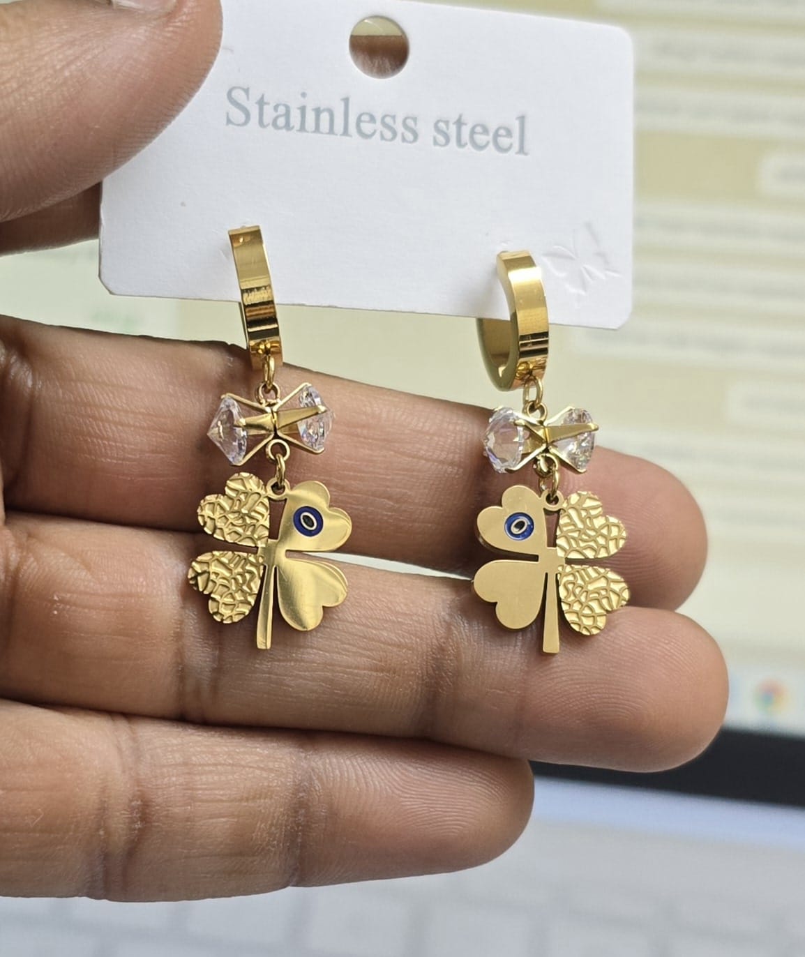 Golden Clover with Crystal Bow Dangle Earrings
