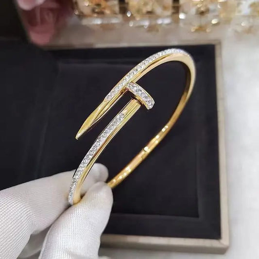 Elegant Nail-Inspired Gold Bracelet with Crystals